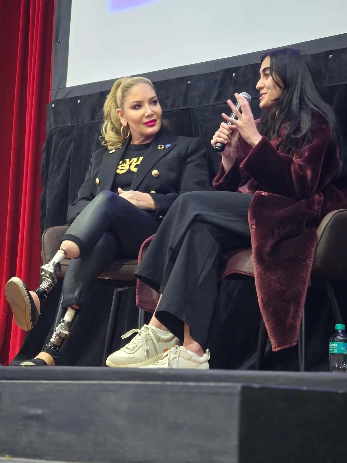 Stephenie Rodriguez on a panel at the Women in Tech Global Summit 2026 in Cape Town, listening to a fellow panelist
